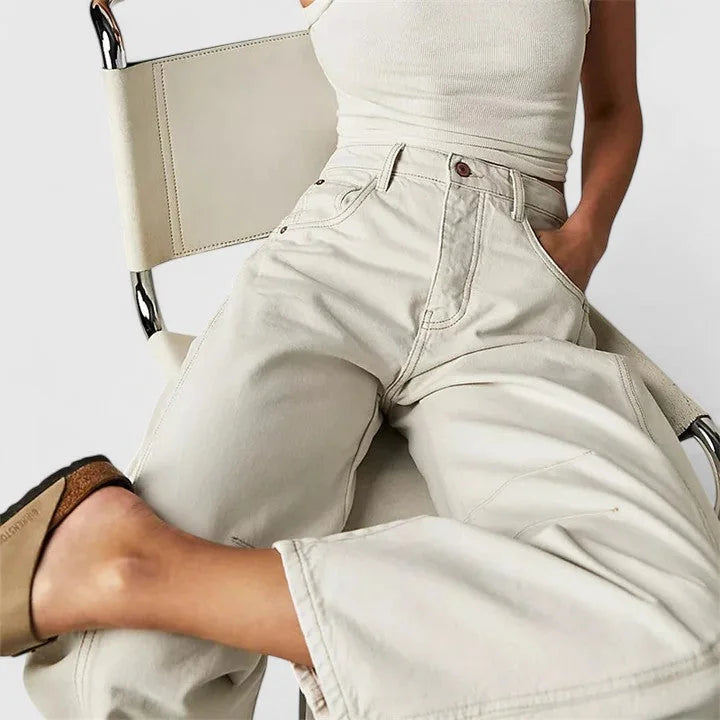 White Women's High-Waist Barrel Leg Jeans — Juliet Curved-Seam Cropped Ankle - Close Up Seated