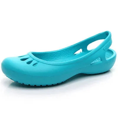Blue Women's Waterproof Slingback Jelly Clogs — Trixie Rounded-Toe Cutout Flat - Studio Side Angle
