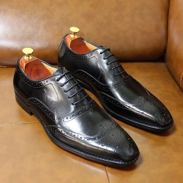 Black Men's Wingtip Brogue Oxford Shoes — Knox Leather Lace-Up Formal - Front Pair On Sofa