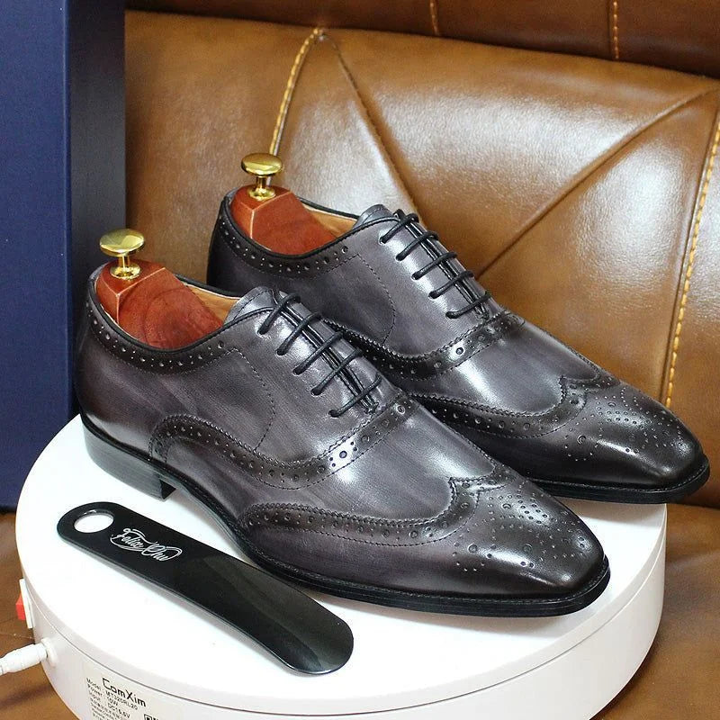 Gray Men's Wingtip Brogue Oxford Shoes — Ezra Cushioned Lace-Up Formal - Angled Pair Stand
