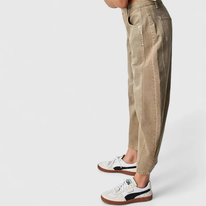 Beige Women's High-Waist Barrel Leg Jeans — Juliet Curved-Seam Cropped Ankle - Side Pose Sneakers