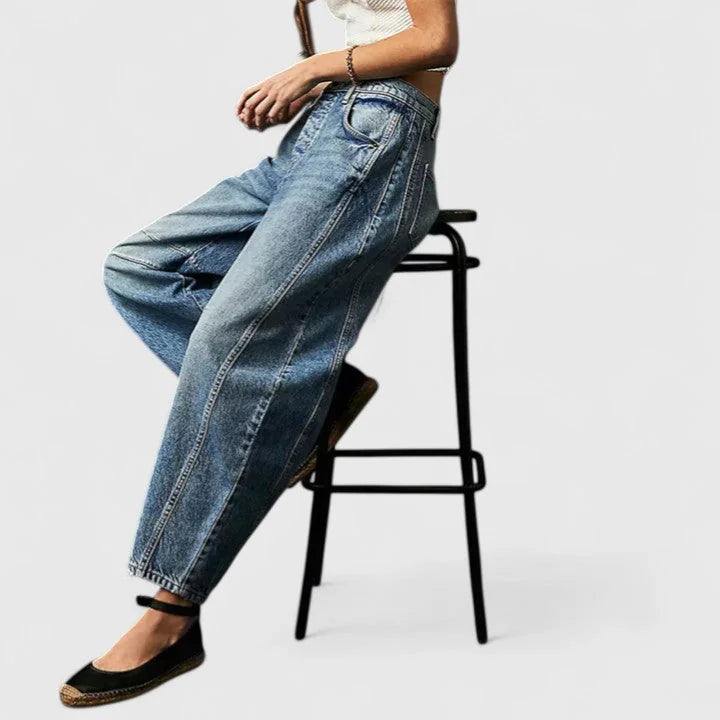 Blue Women's High-Waist Barrel Leg Jeans — Juliet Curved-Seam Cropped Ankle - Side Seated Stool