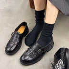 Black single strap with buckle Women's Brogue Loafers with Fringed Detail & Cushioned Comfort - Close Up Paired Feet