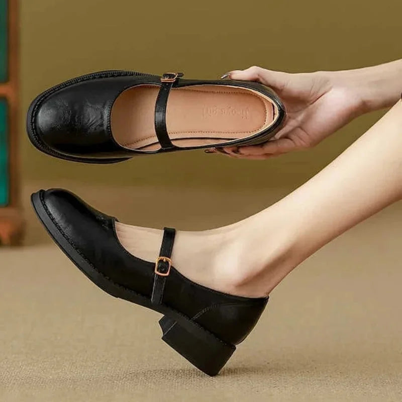 Black Women's Leather Mary Janes — Maisie Buckle-Strap Round-Toe Block Heel - Hand Holding Detail