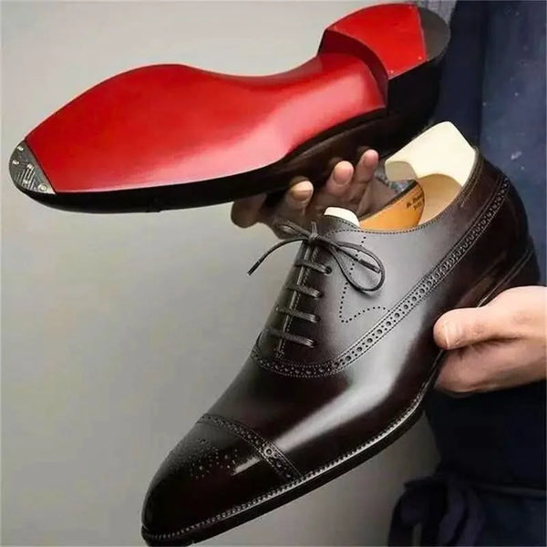 Brown Men's Cap-Toe Leather Oxford Shoes — Blakely Formal Lace-Up Brogue - Sole Detail Hand Held