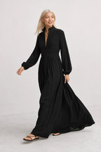 Black Women's Collared A-Line Maxi Dress with Long Sleeves & Relaxed Fit — Tess - Walking Motion