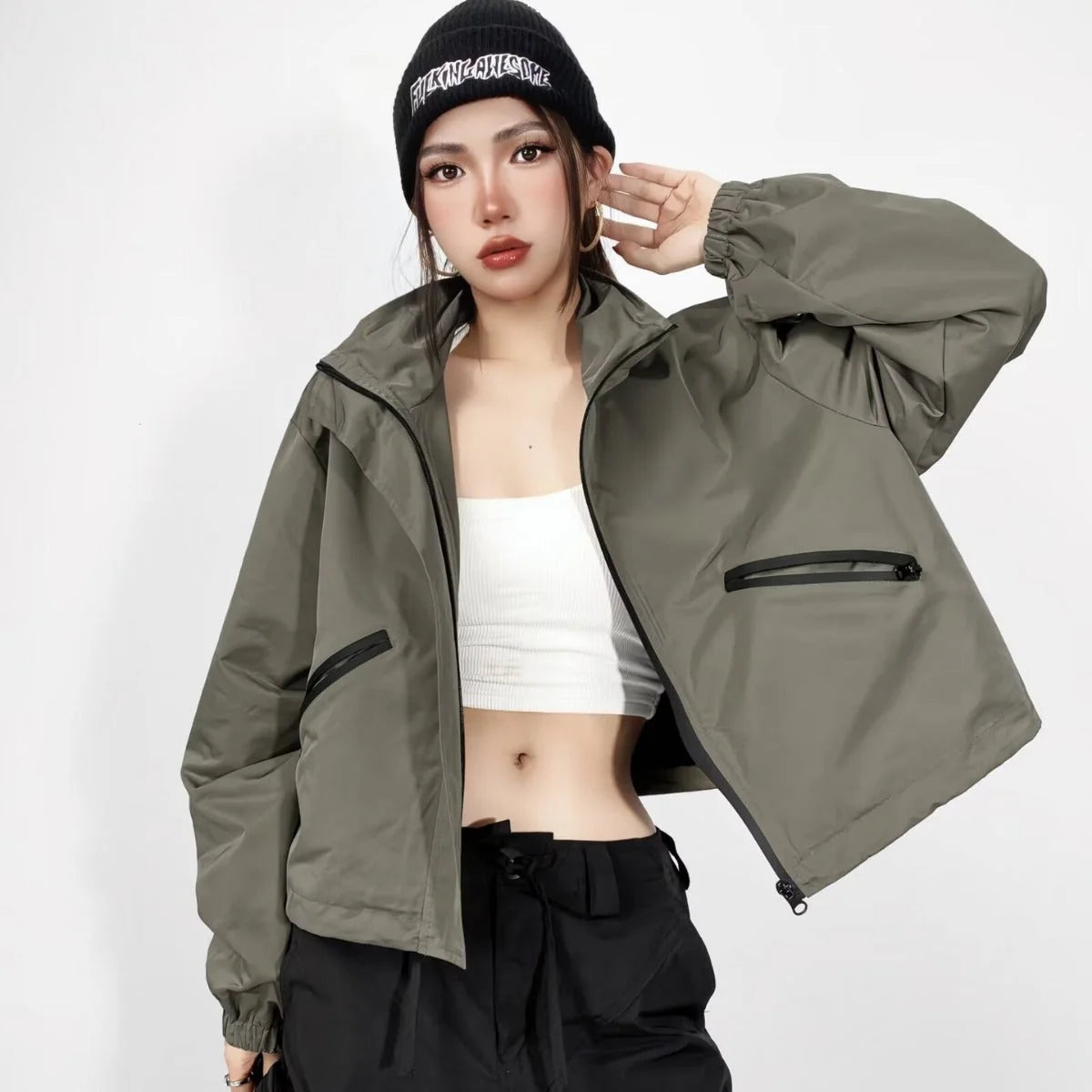 Women's Cropped Rain Jacket with Hooded Design & Elastic Cuffs - Green Worn Lifestyle