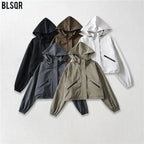Women's Cropped Rain Jacket with Hooded Design & Elastic Cuffs - Flat Lay Colors
