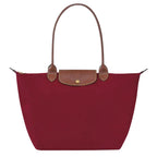 Red Women's Foldable Nylon Tote Bag with Leather Trim - Front Clean