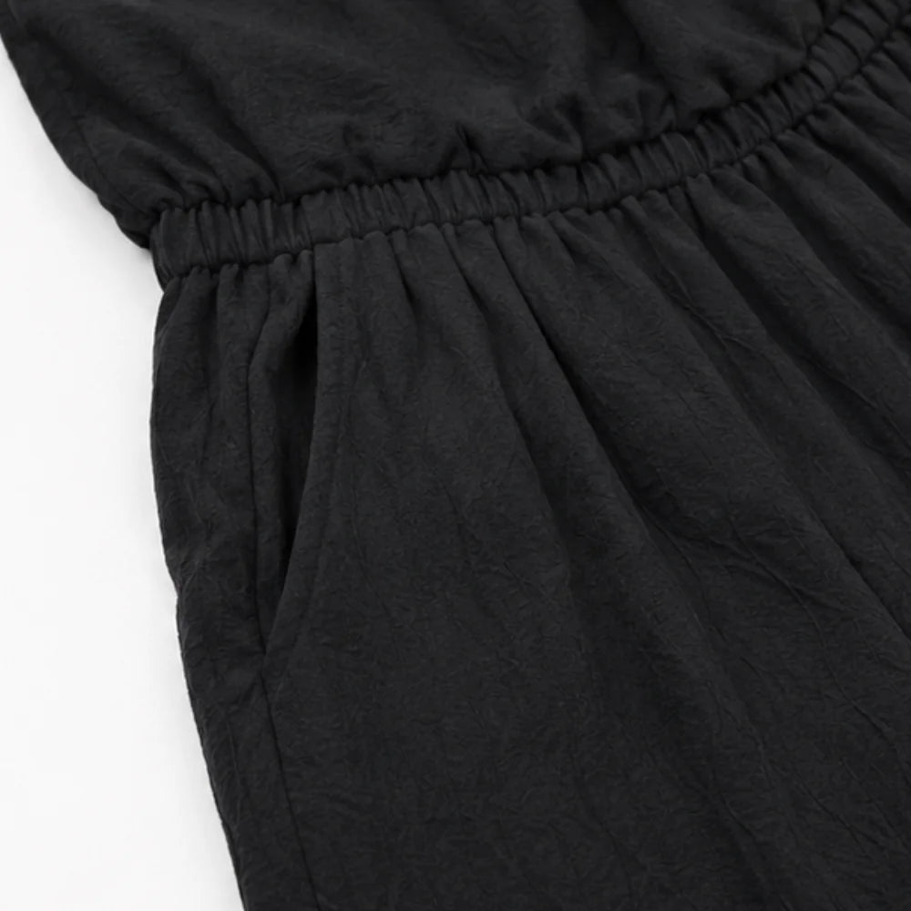 Black Women's Halter Neck Jumpsuit with Cowl Neckline & Wide-Leg Pockets — Marlow - Close Up Waist Pocket