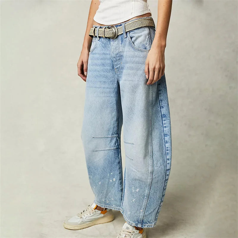 Light Blue Women's High-Waisted Barrel Jeans — Rhea Denim Wide-Leg Relaxed - Side Pose Splatter