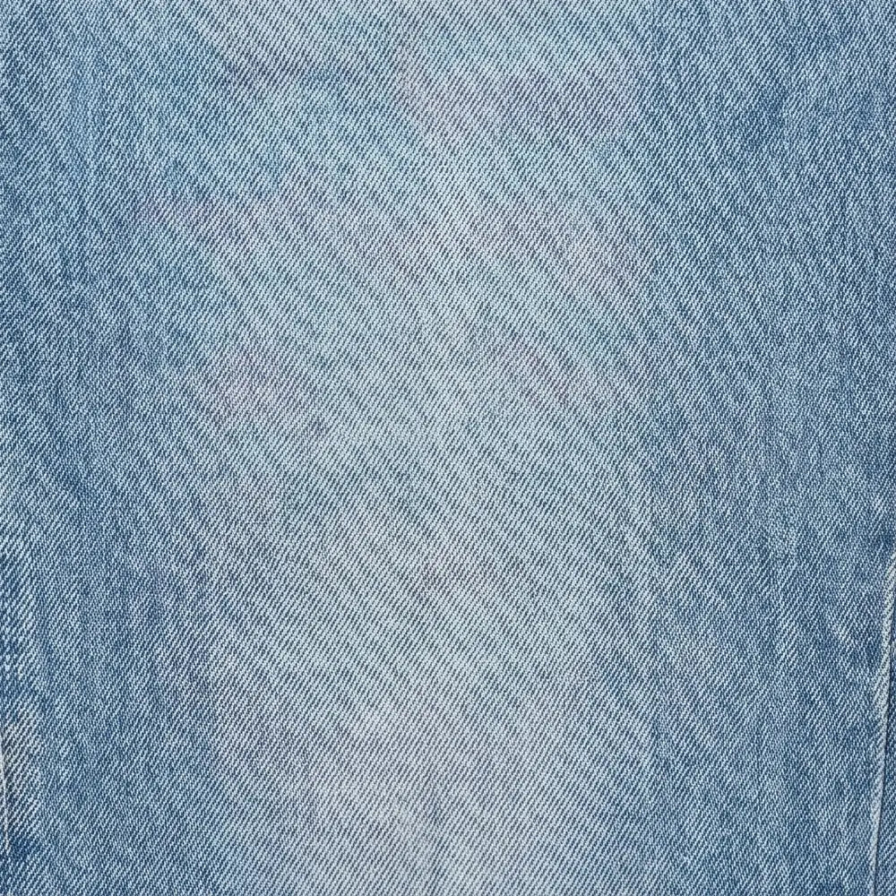 Light Blue Women's High-Waisted Cropped Barrel Jeans — Allie Relaxed Curved-Seam Pockets - Fabric Texture Closeup
