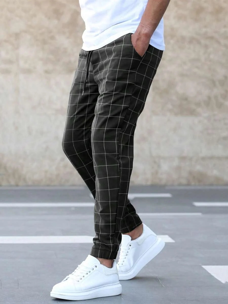Black Men's Plaid Jogger Trousers with Drawstring Waist & Tapered Cuff - Front Standing Pose