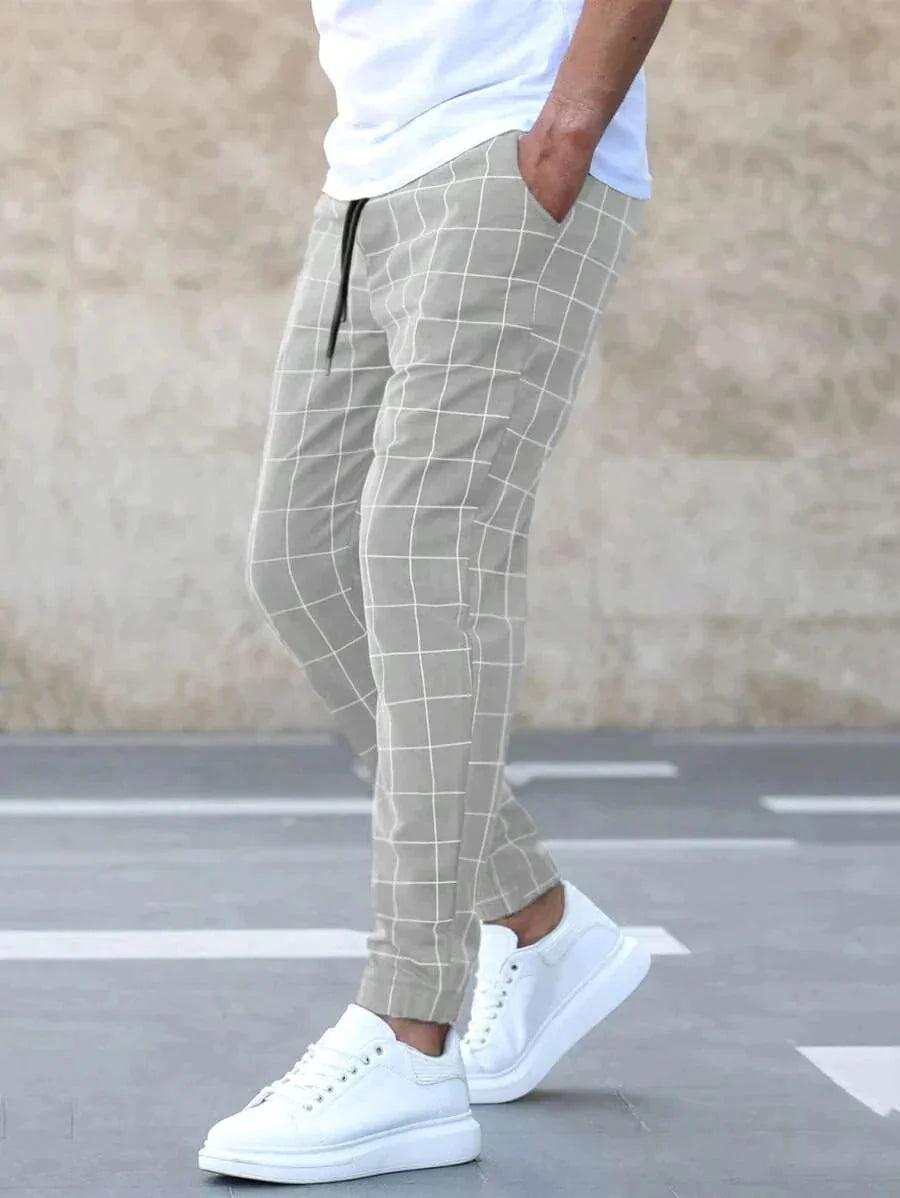 Men's Plaid Jogger Trousers with Drawstring Waist & Tapered Cuff - Side Walking Motion