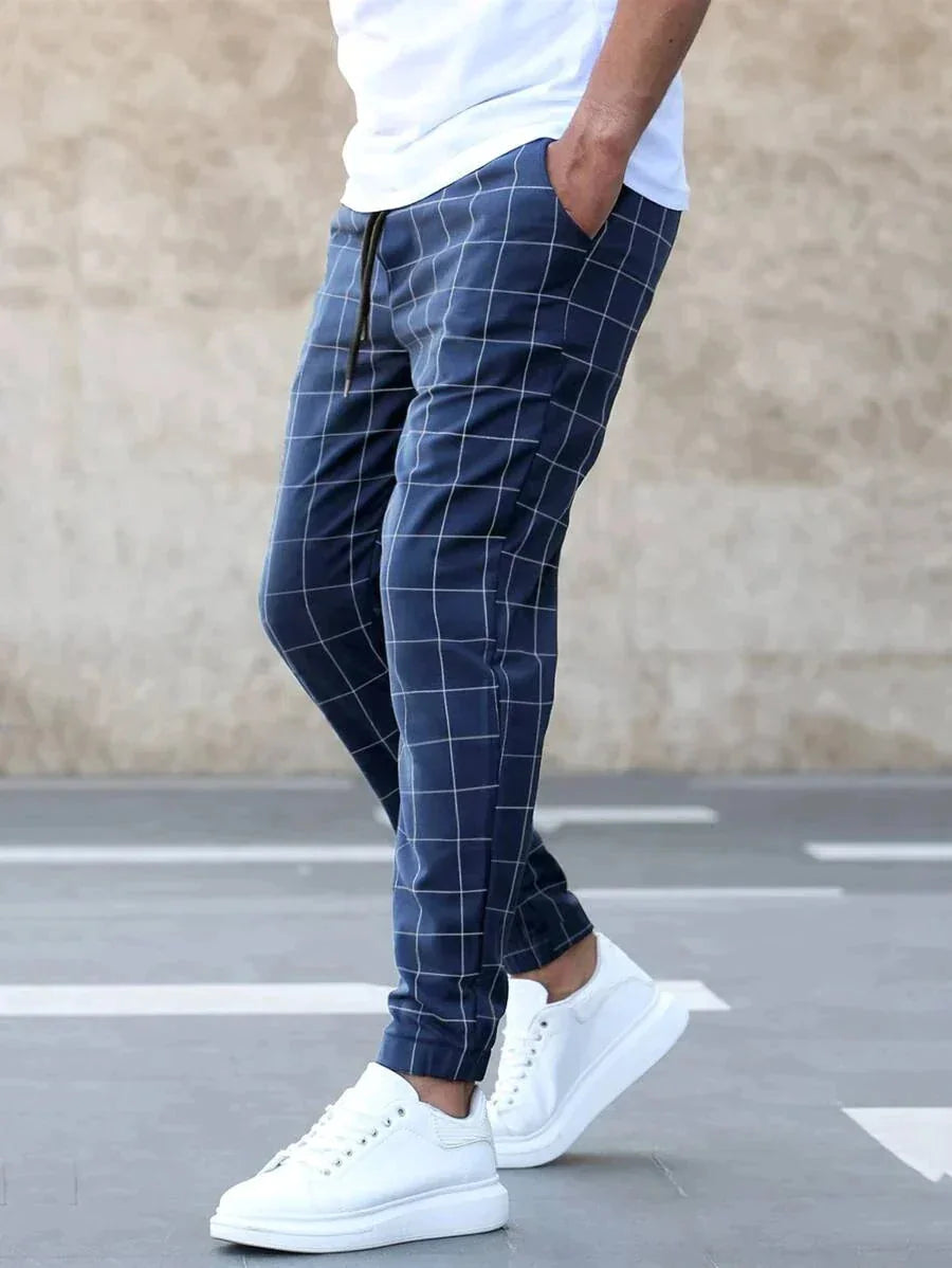 Men's Plaid Jogger Trousers with Drawstring Waist & Tapered Cuff - Side Walking Pose