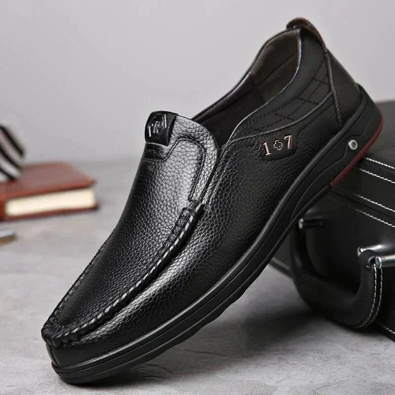 Black Men's Leather Slip-On Shoes — Ethan Cushioned Moc-Toe Work Loafers - Side Profile