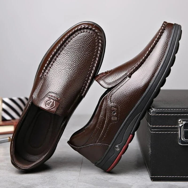 Brown Men's Leather Slip-On Shoes — Ethan Cushioned Moc-Toe Work Loafers - Pair Angled Flat