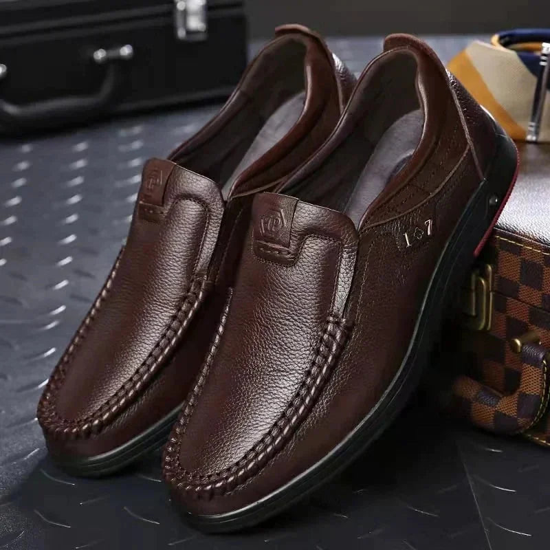 Brown Men's Leather Slip-On Shoes — Ethan Cushioned Moc-Toe Work Loafers - Pair Front Angled