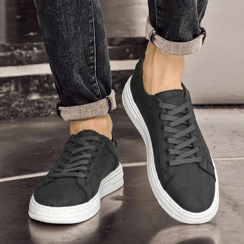 Black Men's Leather Walking Sneakers — Harvey Textured Lace-Up Low-Top - Worn Walking Pair