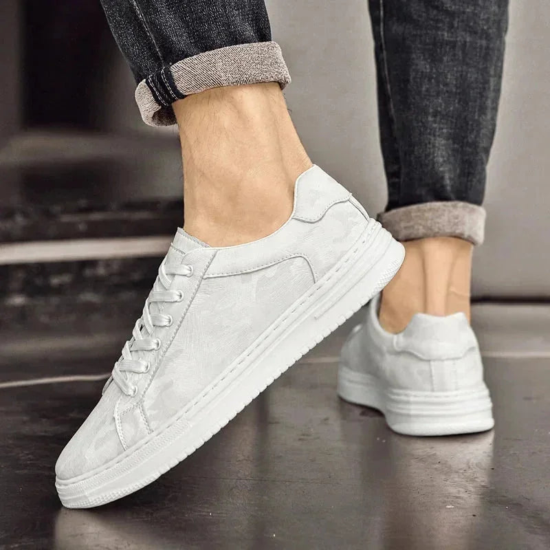 White Men's Leather Walking Sneakers — Harvey Textured Lace-Up Low-Top - Worn Walking Motion