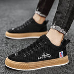 Black Women's Low Top Sneakers with Lace-Up Closure & Cushioned Platform Sole — Hannah - Side Angle Worn