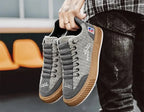 Grey Women's Low Top Sneakers with Lace-Up Closure & Cushioned Platform Sole — Hannah - Held Pair In Hand