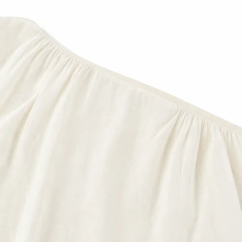 Ivory Women's Wide-Leg Two-Piece Set — May Linen One-Shoulder Batwing - Close Up Neckline Detail
