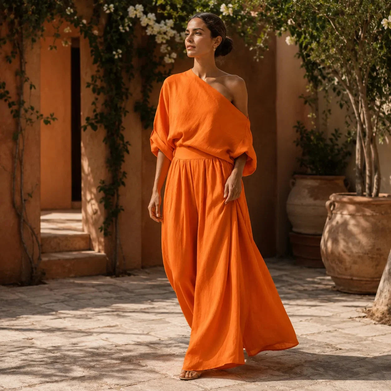Orange Women's Wide-Leg Two-Piece Set — May Linen One-Shoulder Batwing - Model Walking Outdoor