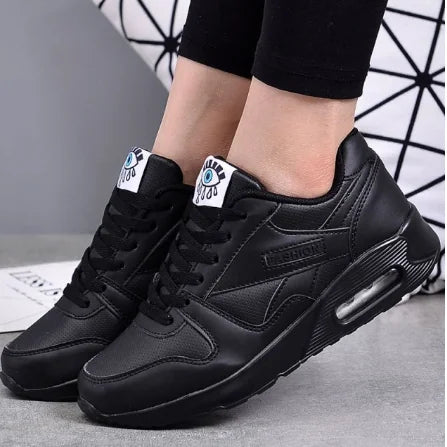 Black Women's Orthopedic Walking Sneakers — Clementine Cushioned Lace-Up Athletic - Front Worn Pose