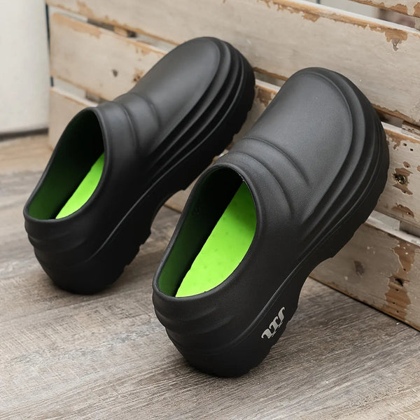Black Unisex Platform Orthopedic Waterproof Clogs — Edie Slip-On Non-Slip Cushioned - Angled Pair View