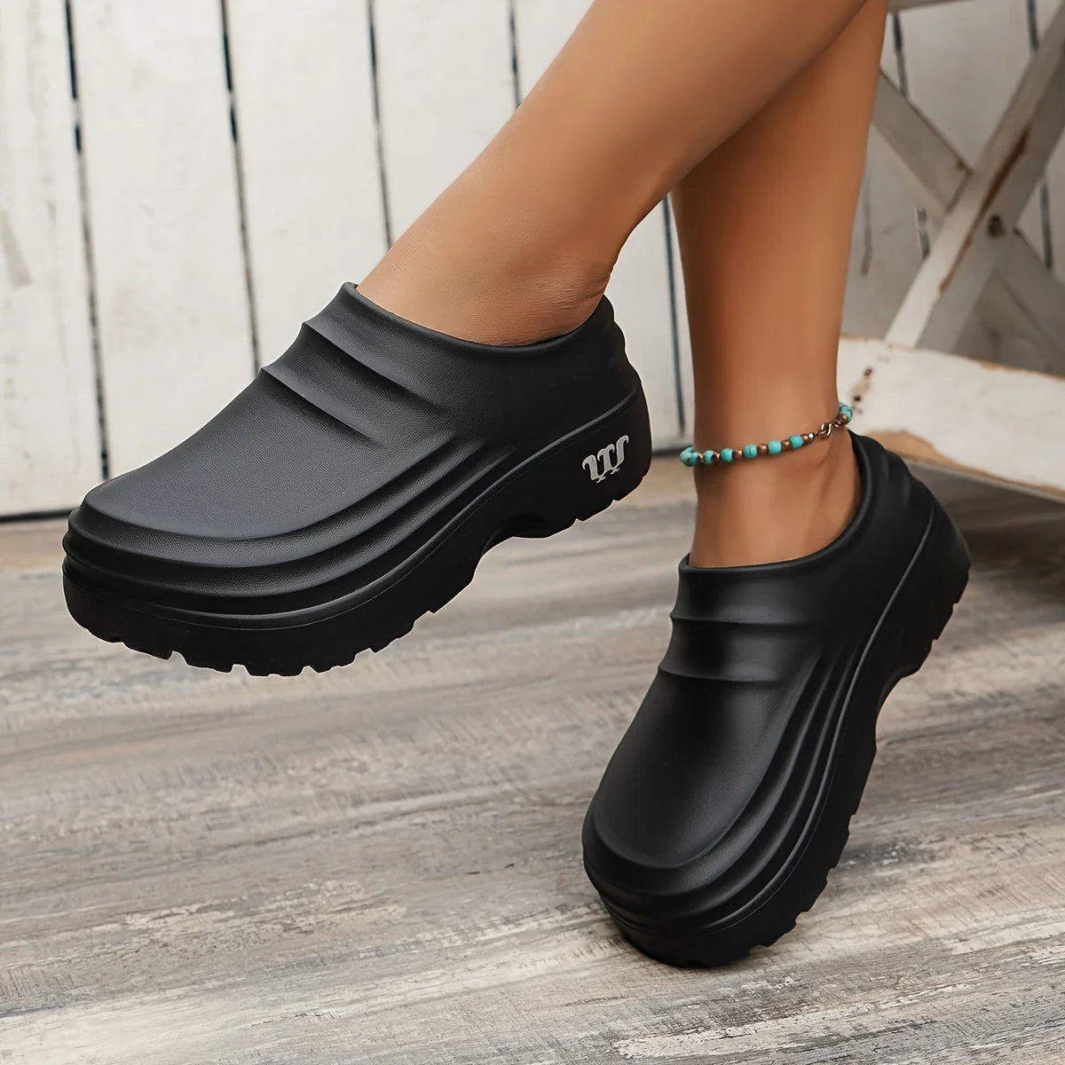 Black Unisex Platform Orthopedic Waterproof Clogs — Edie Slip-On Non-Slip Cushioned - Side Worn Pose