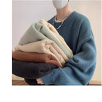 Women's Oversized Sweater with Crew Neckline & Ribbed Cuffs - Front Worn With Folded Stack