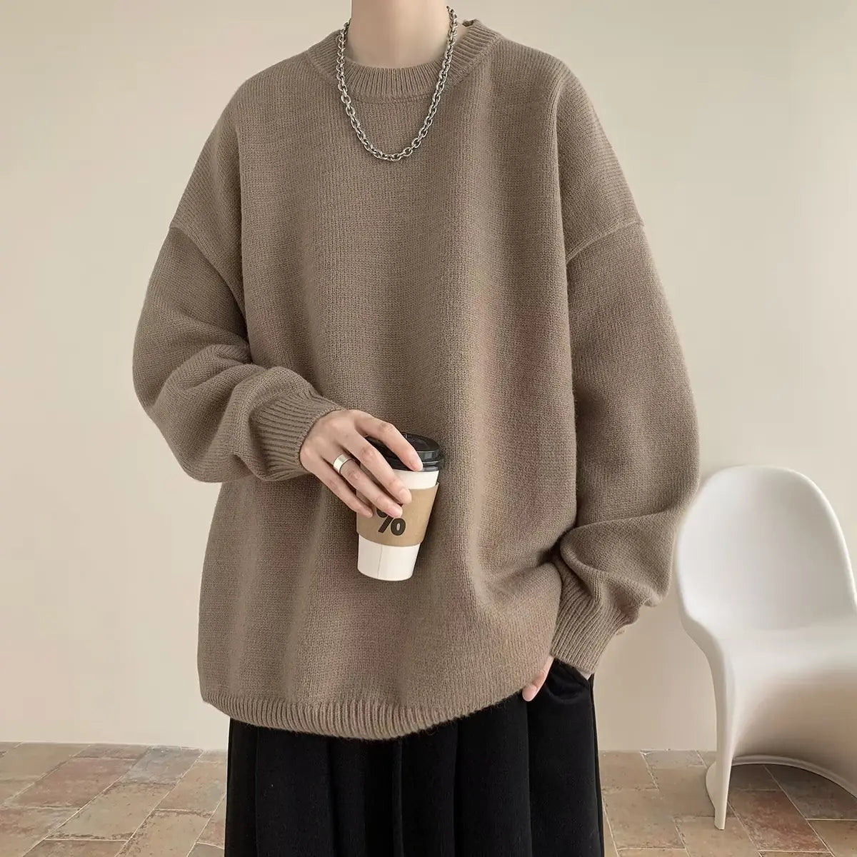 Light Brown Women's Oversized Sweater with Crew Neckline & Ribbed Cuffs - Front Worn Holding Coffee
