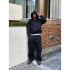 Men's Oversized Tracksuit with Drawstring Hood & Ribbed Cuffs - Front Pose Wall