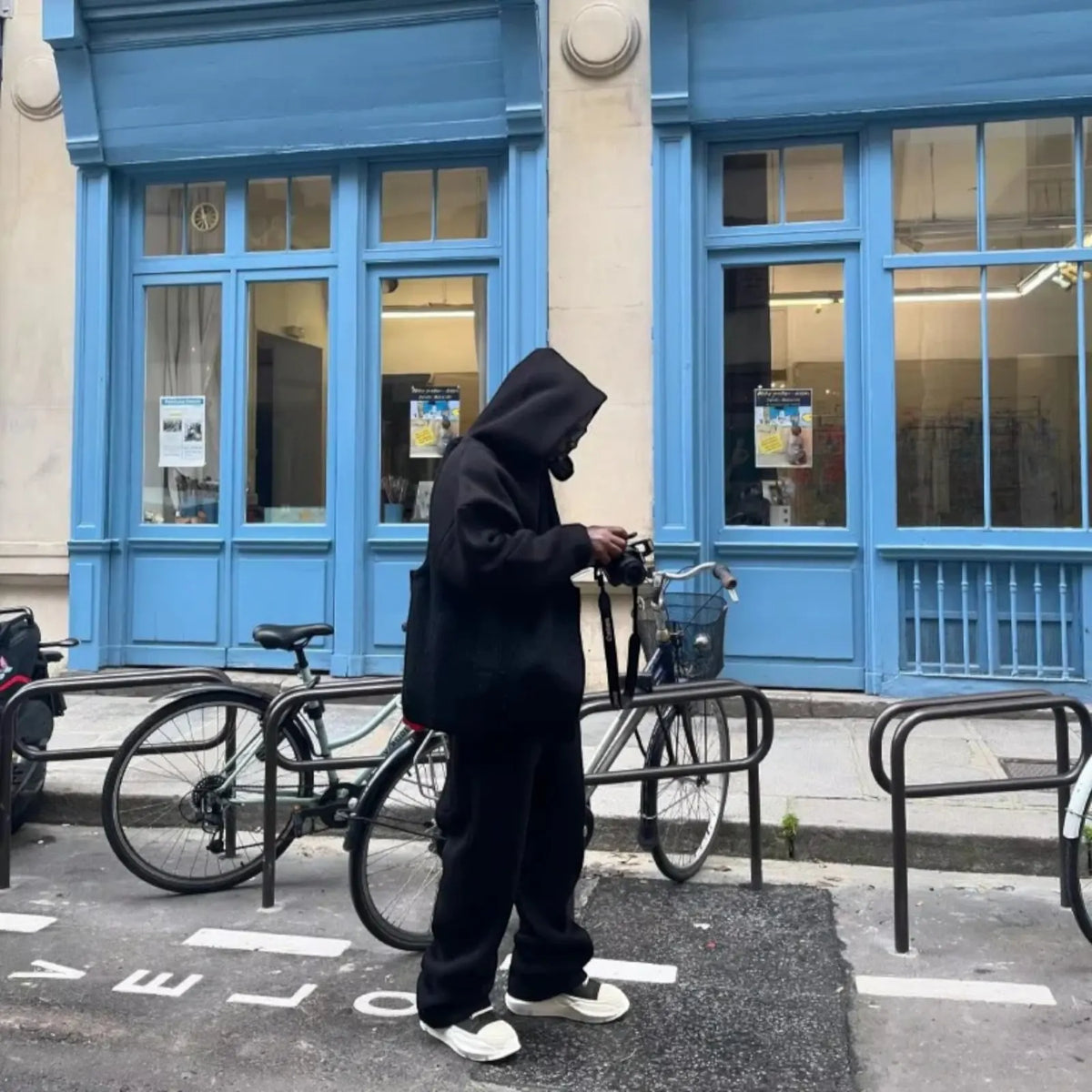 Men's Oversized Tracksuit with Drawstring Hood & Ribbed Cuffs - Side Pose Street