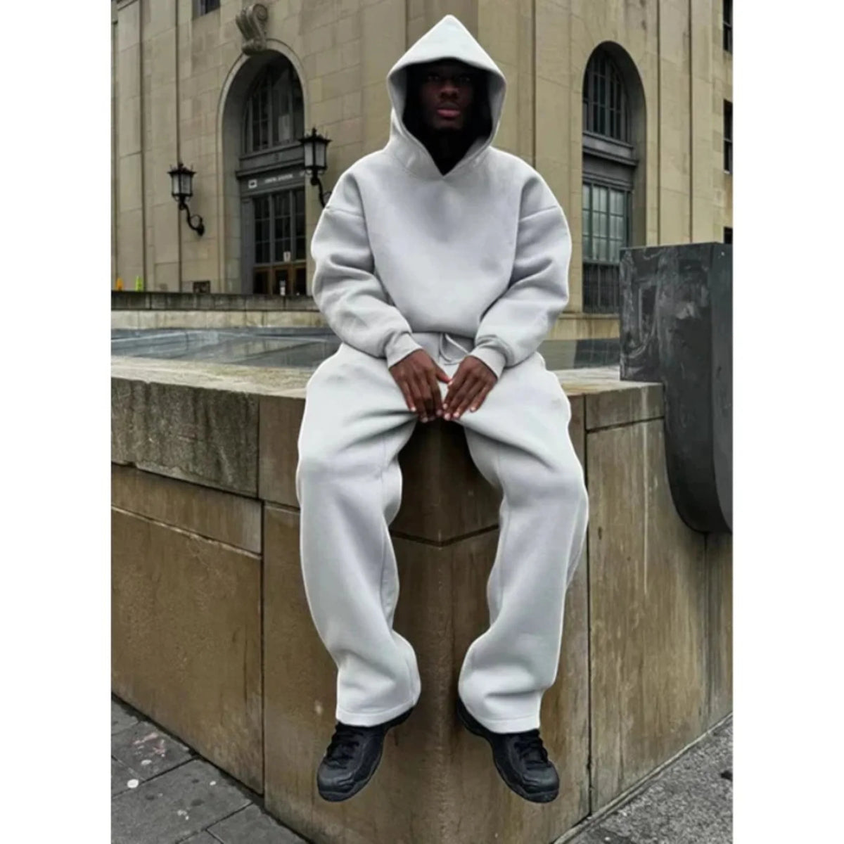 Men's Oversized Tracksuit with Drawstring Hood & Ribbed Cuffs - Seated Ledge Pose