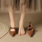 Brown Women's Pointed Toe Leather Flats — Clementine Buckle Mary Block Heel - Model Standing Pair