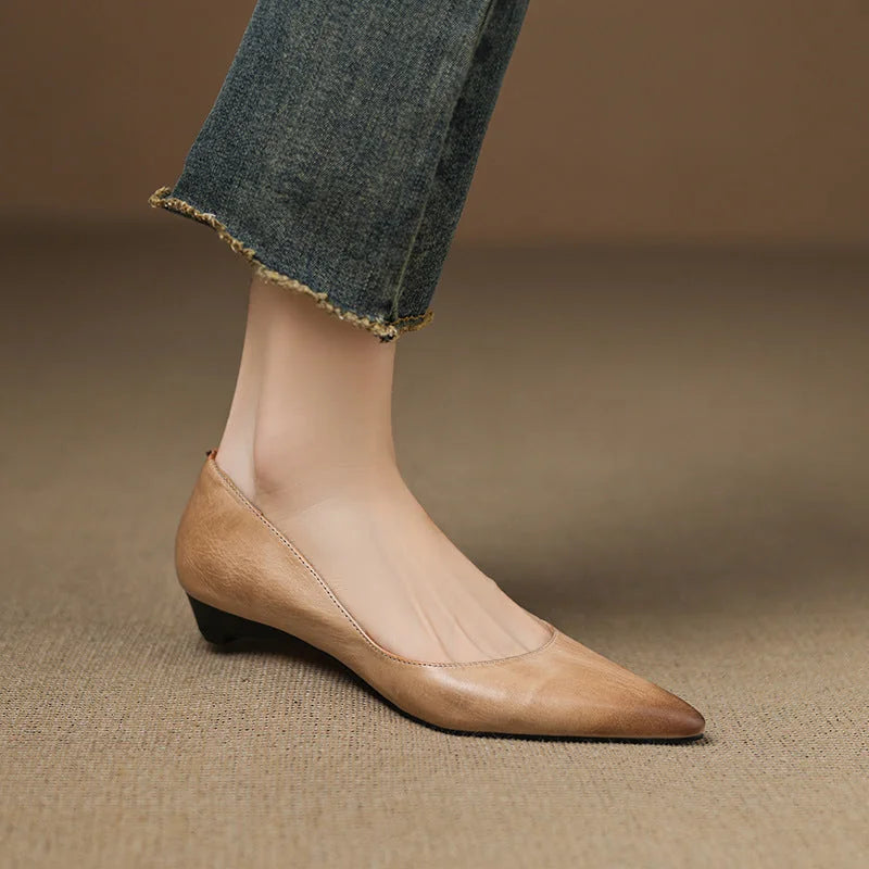 Apricot Women's Pointed Toe Leather Flats — Marielle Cushioned Wedge Heel - Close Up Worn Angle