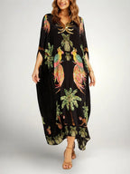 Black Women's Kaftan-Style Tropical Print Dress with Relaxed Drop-Shoulder Sleeves — Raina - Front Full Smile