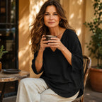 Black Women's V-Neck Linen Blouse — Elise Curved Hem Three-Quarter Sleeve Relaxed - Seated Lifestyle