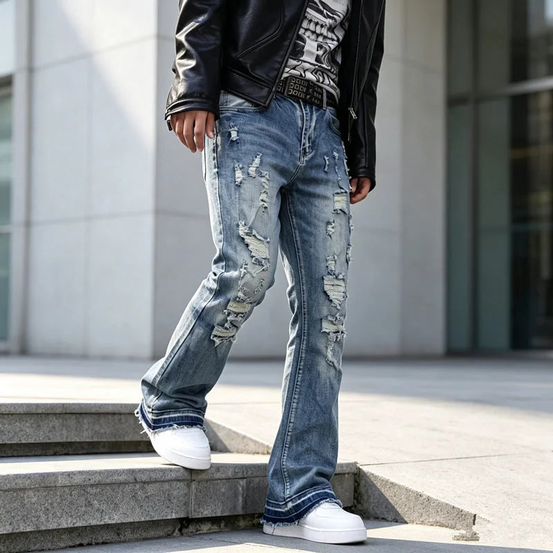 Blue Men's Ripped Slim-Fit Flared Jeans with Distressed Detailing - Front Stair Pose