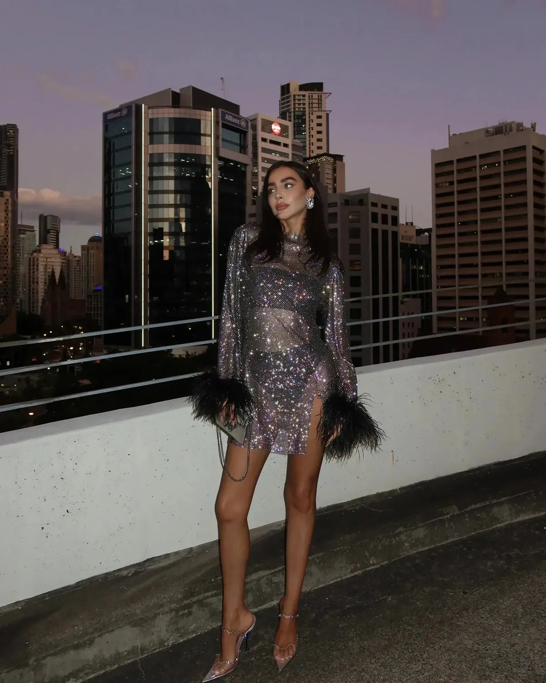 Black Women's Sequin Mini Party Dress — Una Feather Trim Bodycon - Rooftop Pose