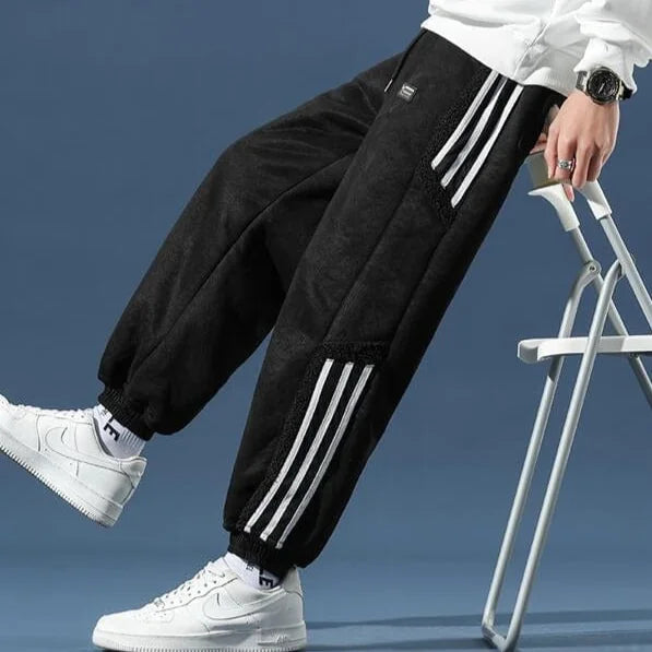 Men's Jogger Pants with Sherpa Lining & Striped Side Panels - Leaning Detail