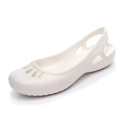 White Women's Waterproof Slingback Jelly Clogs — Trixie Rounded-Toe Cutout Flat - Studio Side Angle Cream