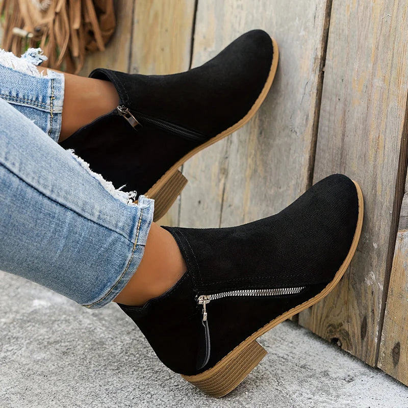 Black Women's Suede Ankle Boots — Yasmin Zip-Up Block Heel Pointed Toe - Hanging Off Wall
