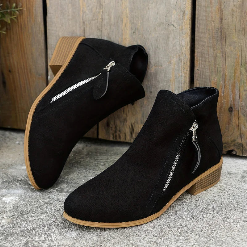Black Women's Suede Ankle Boots — Yasmin Zip-Up Block Heel Pointed Toe - Pair On Ground Angled