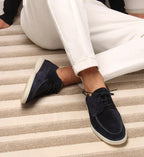 Dark Blue Men's Suede Lace-Up Loafers with Moc Toe Detail - Seated Side Pose