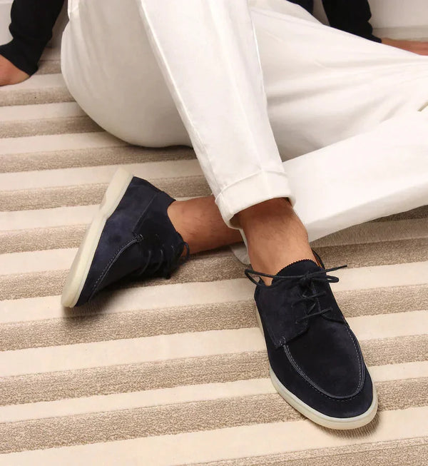 Dark Blue Men's Suede Lace-Up Loafers with Moc Toe Detail - Seated Side Pose