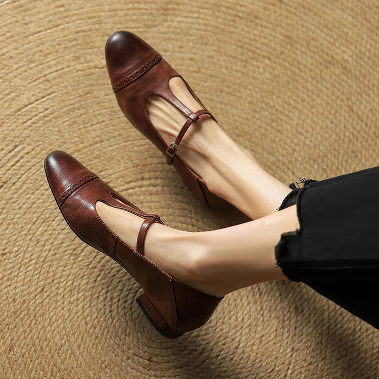 Brown Women's T-Strap Mary Leather Flats — Hannah Buckle Cap-Toe - Top View Worn Crossed