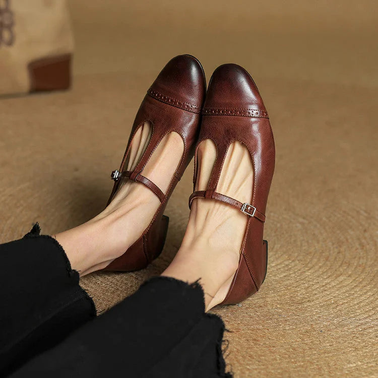 Brown Women's T-Strap Mary Leather Flats — Hannah Buckle Cap-Toe - Top View Worn Toes